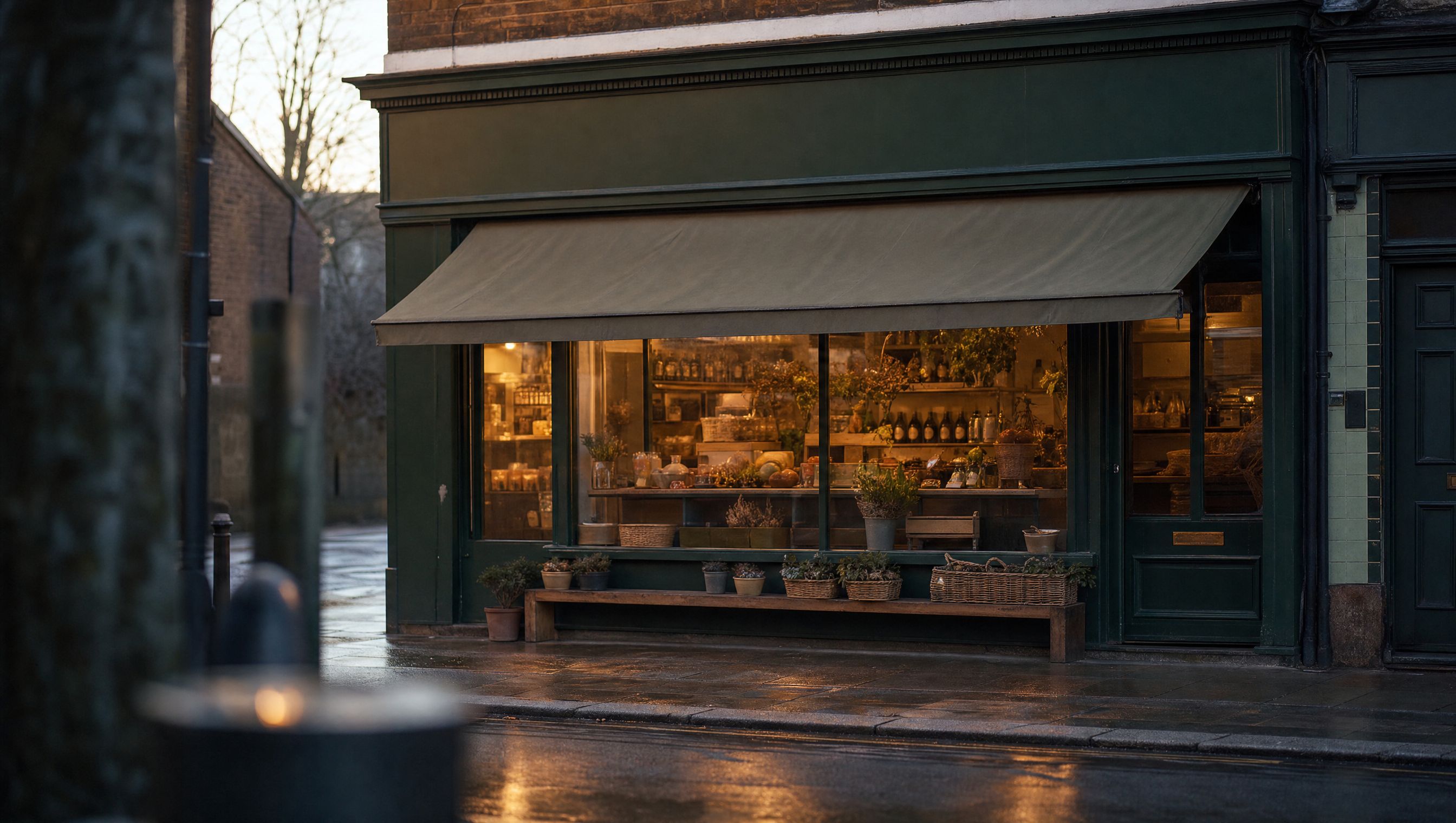 Small independent shopfront seen from across the street at early morning